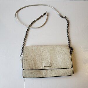 Coach crossbody bag.Small, rectangular bag with a flap closure